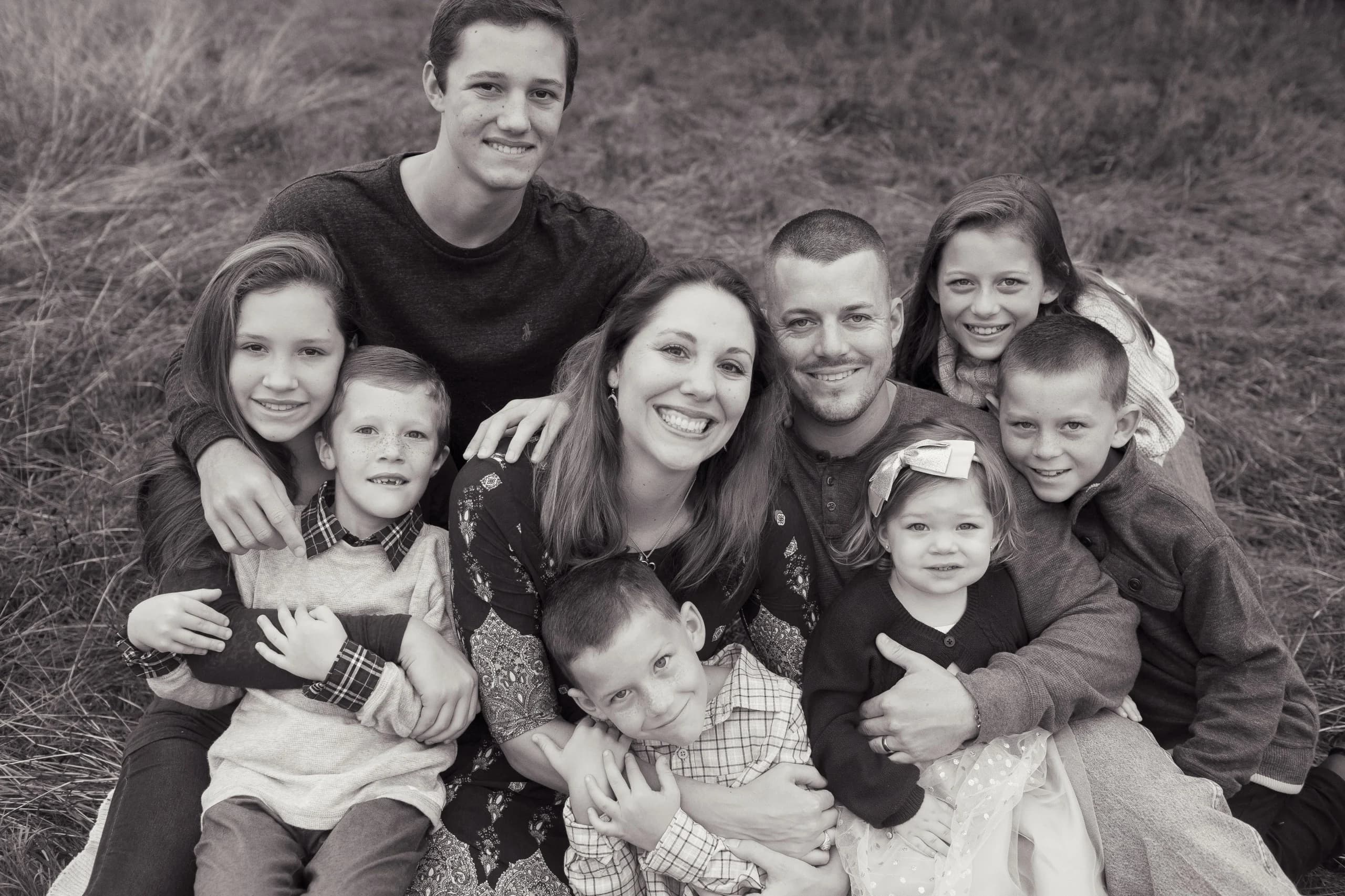Tim McCoy with his wife and seven children - the McCoy family of Central Texas